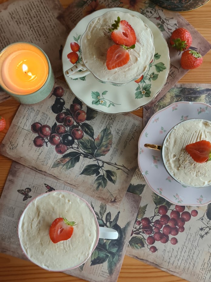 Fraisier cups with fresh strawberries on a plate